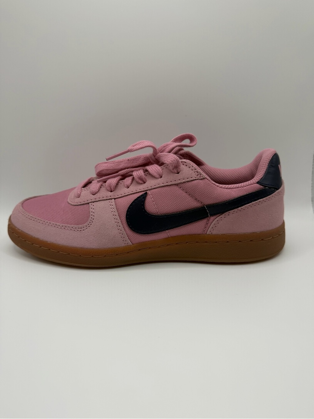 Nike Dusty Pink Low-Top Sneaker with Black Swoosh and Gum Sole